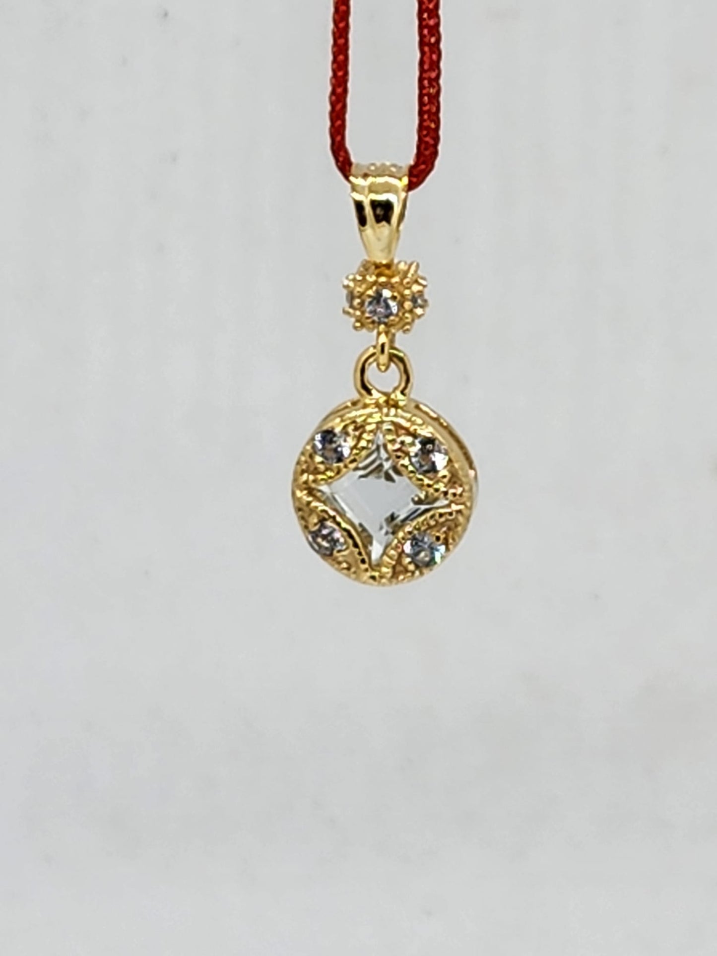 14K Pendant with, 1 Center Stone Princess Cut: 5mm, 4 AQUAMARINE Round Stone: 2mm, 4 AQUAMARINE Stone: 1.3mm Only Pendant