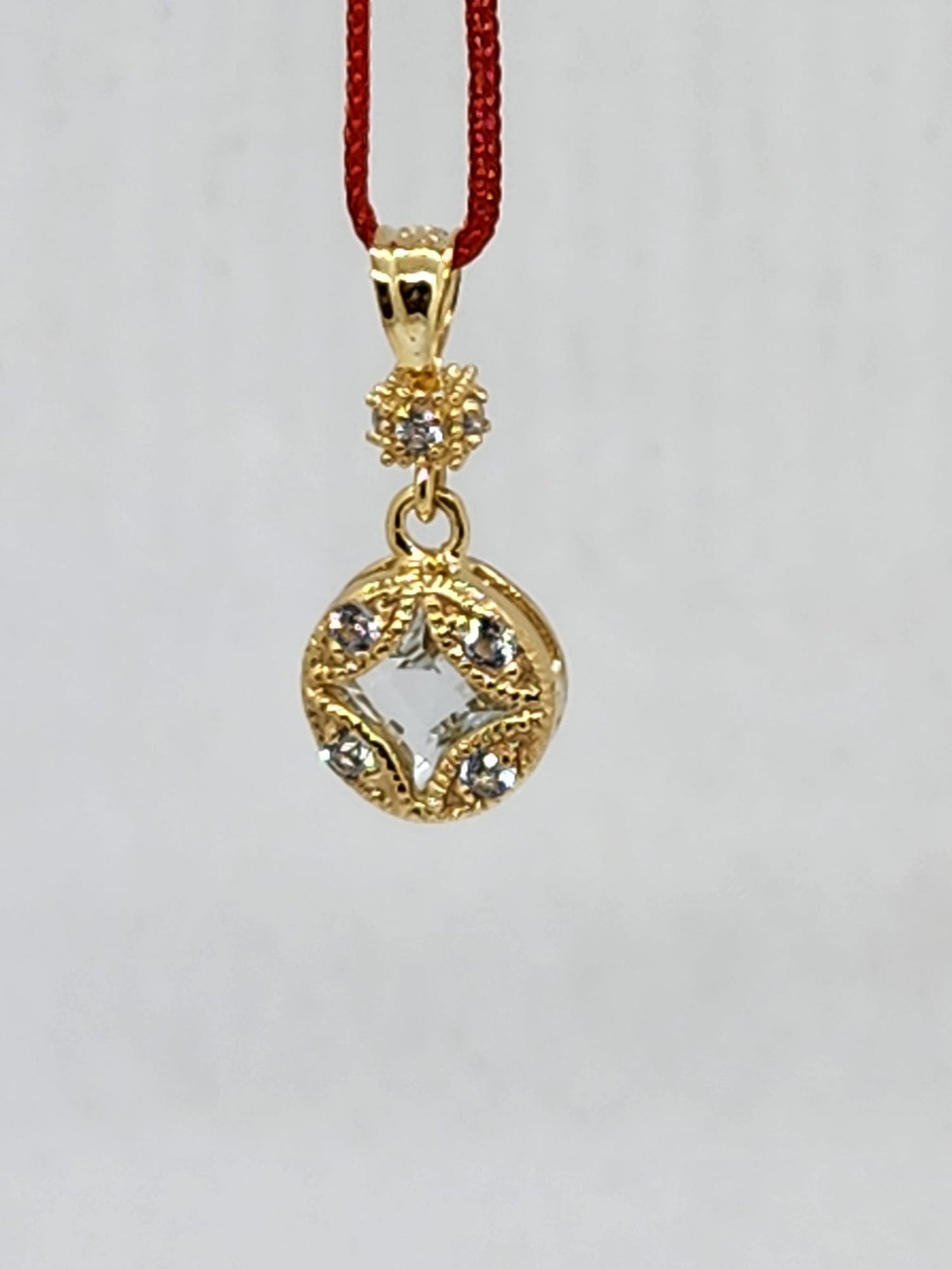 14K Pendant with, 1 Center Stone Princess Cut: 5mm, 4 AQUAMARINE Round Stone: 2mm, 4 AQUAMARINE Stone: 1.3mm Only Pendant