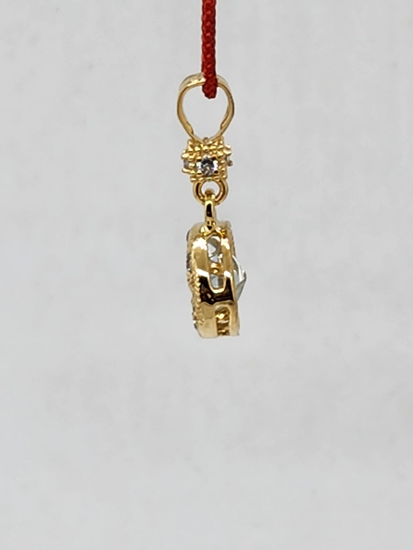 14K Pendant with, 1 Center Stone Princess Cut: 5mm, 4 AQUAMARINE Round Stone: 2mm, 4 AQUAMARINE Stone: 1.3mm Only Pendant
