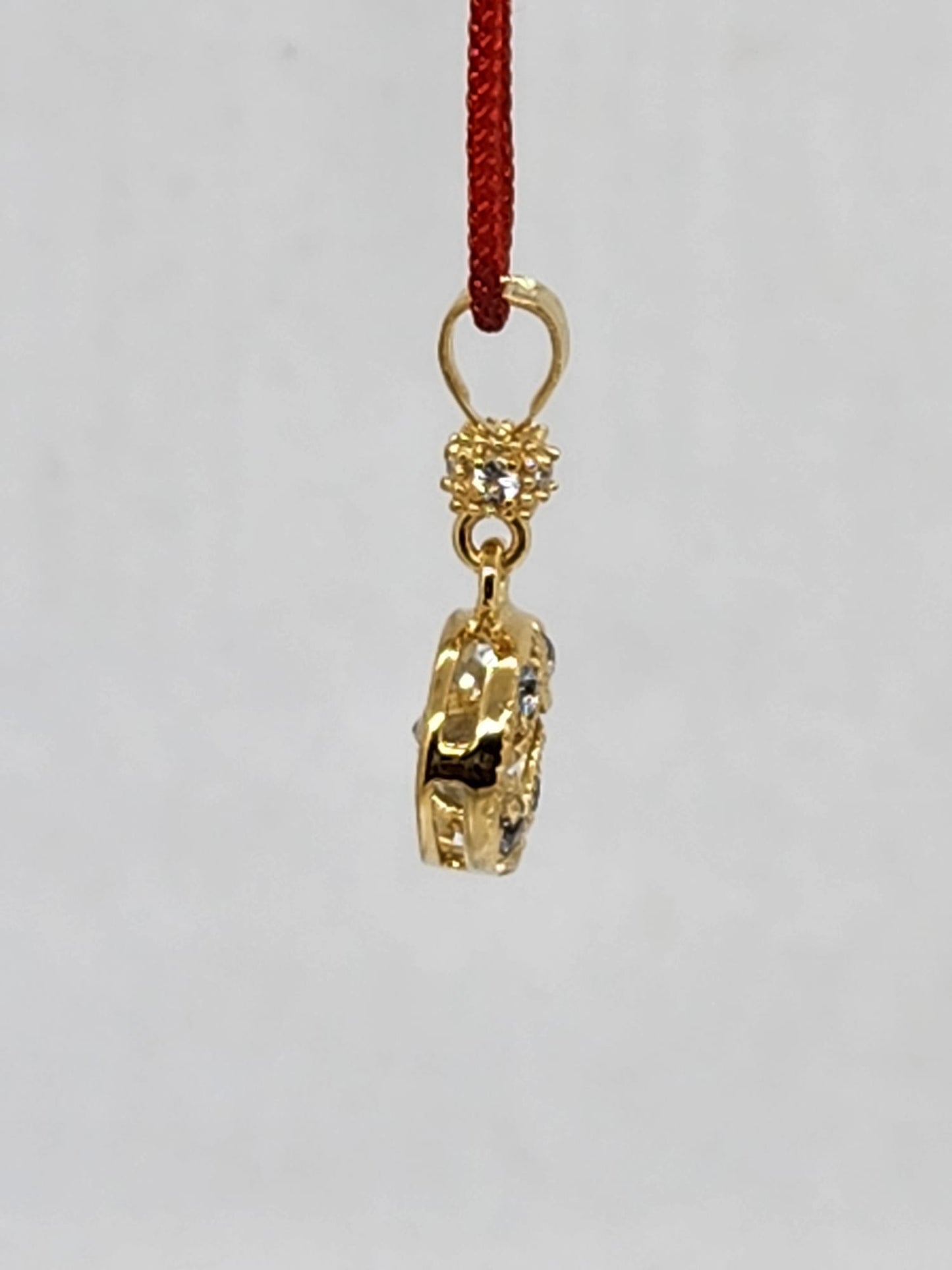 14K Pendant with, 1 Center Stone Princess Cut: 5mm, 4 AQUAMARINE Round Stone: 2mm, 4 AQUAMARINE Stone: 1.3mm Only Pendant