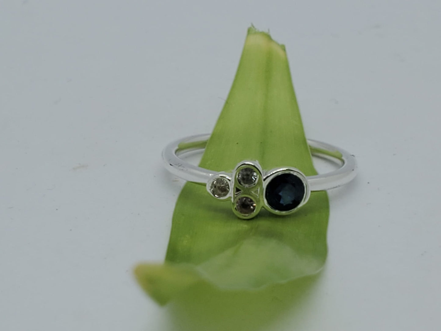 14k white gold ring, it has 3 Diamonds and 1 Natural Sapphire, for daily use and comfortable