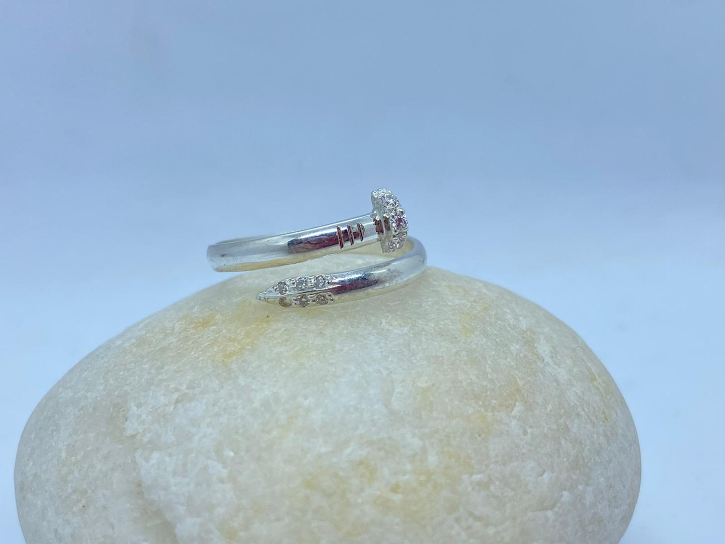 14k white gold ring with 9 Diamonds, nail style, is comfortable and elegant